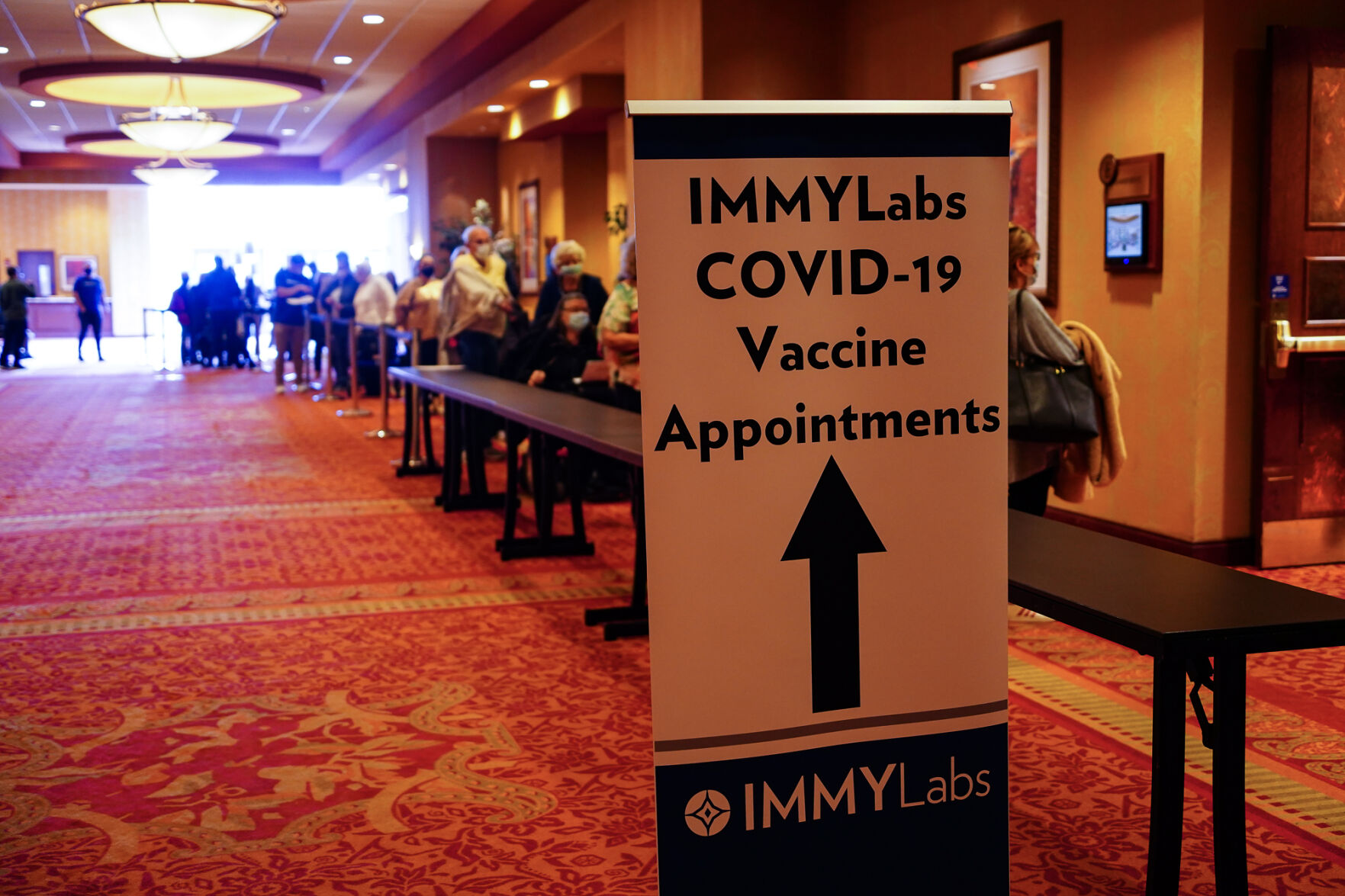IMMY check-in sign